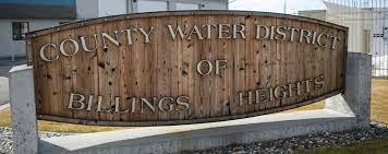 Wooden sign with County Water District of Billing Heights text